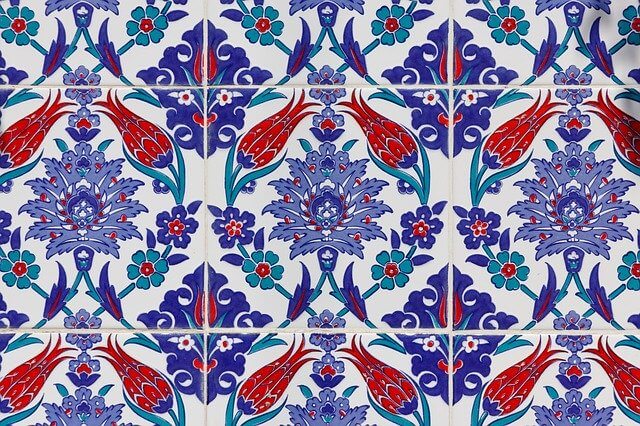 close up of purple, blue and red tiles with intricate designs