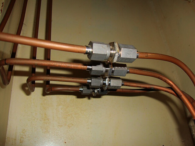 3 copper tubes side by side by side